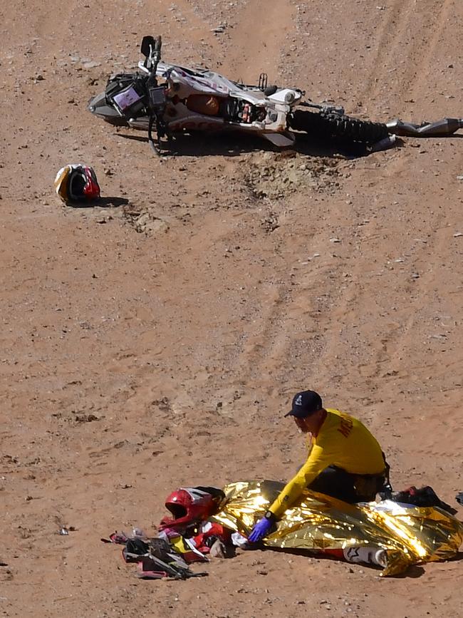 Medics attend to Portuguese rider Paulo Goncalves. Picture: Franck Fife/AFP