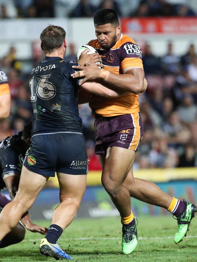 Brisbane’s Payne Haas is tackled by Cowboys forward Scott Bolton during the Round 21 NRL match at 1300SMILES Stadium in Townsville, Thursday, August 8, 2019. (AAP Image/Michael Chambers) NO ARCHIVING, EDITORIAL USE ONLY