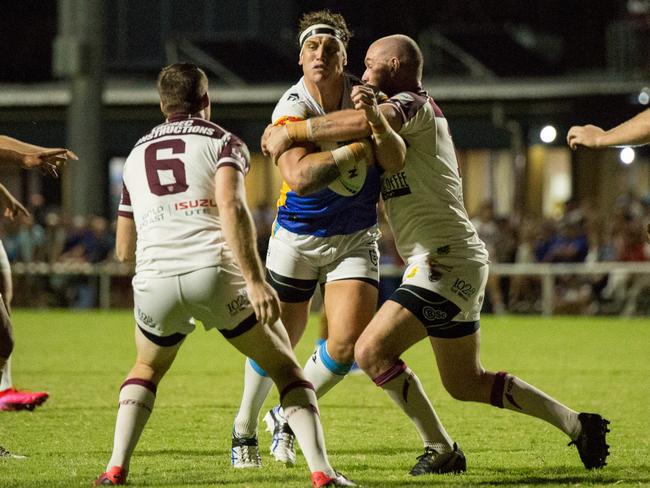 Titans prop Jarrod Wallace takes on the Burleigh defence last night. TITANS MEDIA