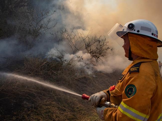 Generic photo of rural firey tackling a bushfire