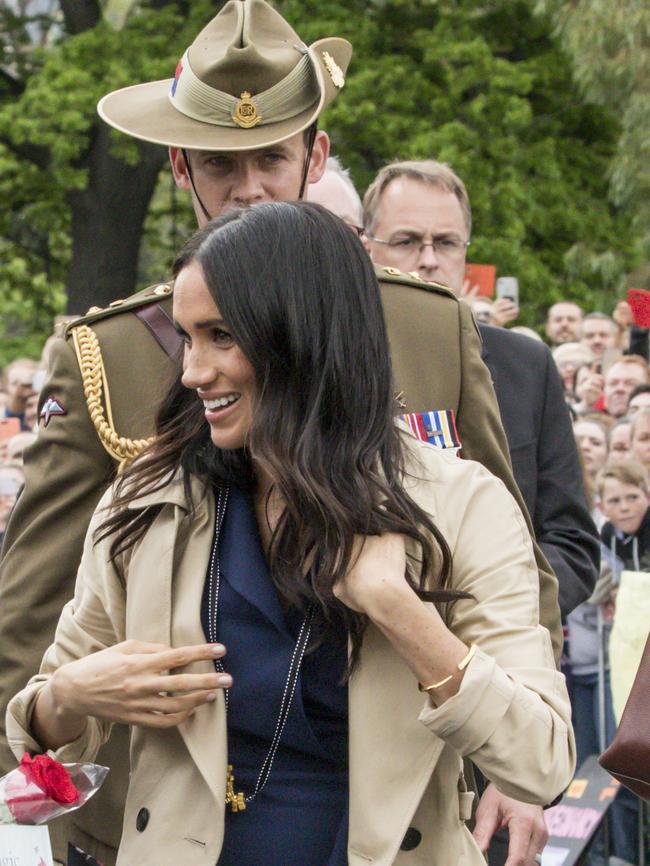 Meghan outside Government House.