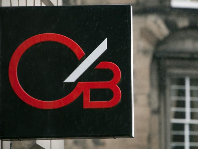 The logo of Clydesdale Bank hangs outside of a branch in Edinburgh, Scotland, on Tuesday, Oct. 11, 2011. Sun Capital, backed by Hugh Osmond, made a 2 billion-pound ($3.1 billion) offer for Clydesdale and Yorkshire bank networks. Photograph: Mike Wilkinson/Bloomberg