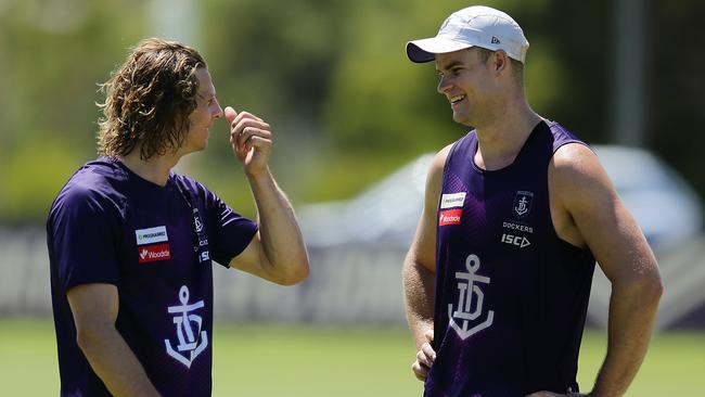 Fremantle big man Sean Darcy, left, chats with skipper Nat Fyfe at training earlier this month. Picture: Will Russell/Getty