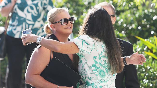 Sally hugs a close friend at the Lidcombe Coroner's Court in western Sydney on the day the inquest findings were delivered. Picture: John Feder/The Australian