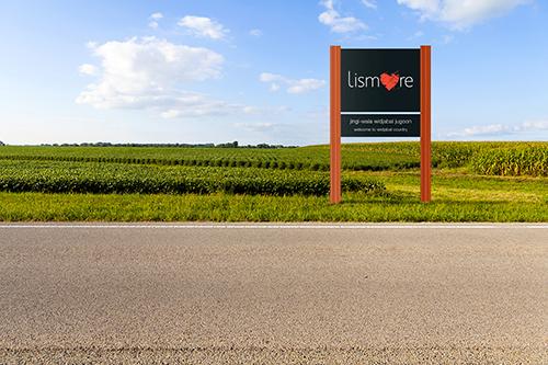 One of the new Lismore gateway signs being put up by Lismore City Council.