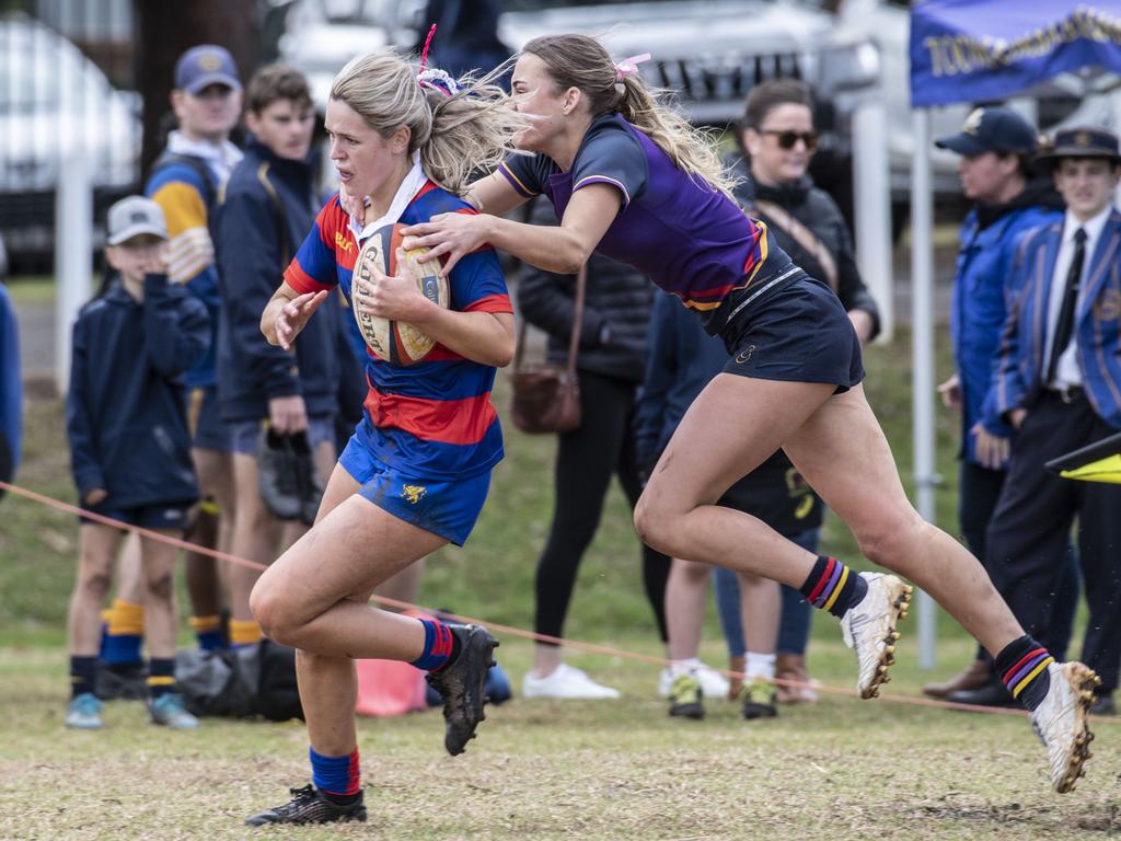 Jess Fitzgibbons for Downlands. Selena Worsley Shield game2. Girl's rugby 7s Downlands vs Glennie. Saturday, August 6, 2022. Picture: Nev Madsen.