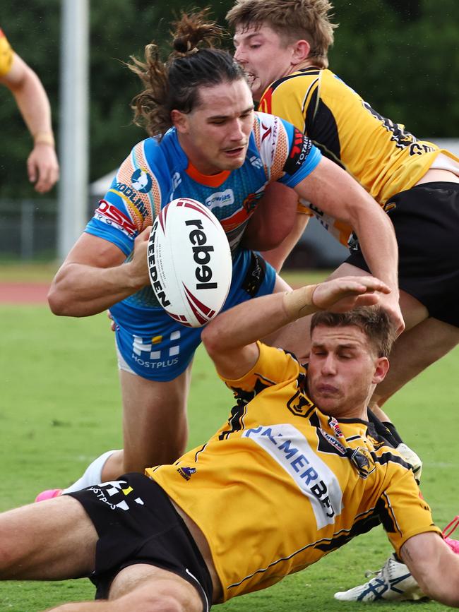 Pride's Tom Chester loses the ball after being hit twice in the Hostplus Cup Queensland Rugby League (QRL) match between the Northern Pride and the Sunshine Coast Falcons, held at Barlow Park, Cairns Picture: Brendan Radke