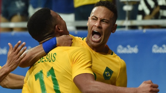 Gabriel Jesus (L) of Brazil celebrates with teammate Neymar.