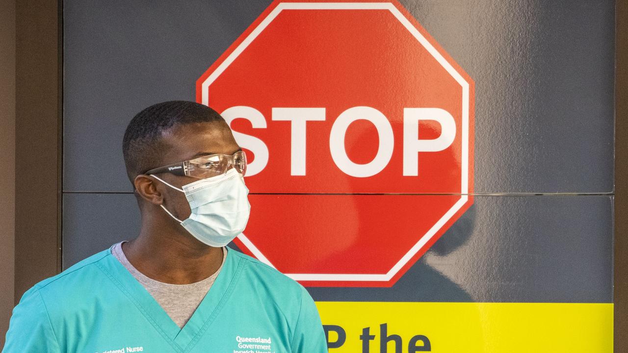 A nurse is seen working at a COVID-19 testing clinic at Ipswich Hospital. Picture: Glenn Hunt/Getty Images