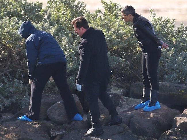 Police on the scene where a woman's body was found on Monday, July 11, 2016, in Altona Beach, Victoria, Australia. Picture: Hamish Blair