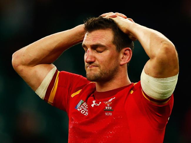 (FILE PHOTO) Sam Warburton has announced his retirement from playing rugby union on July 18, 2018. LONDON, ENGLAND - OCTOBER 17:   Losing Captain Sam Warburton of Wales holds his head in his hands and looks dejected after during the 2015 Rugby World Cup Quarter Final match between South Africa and Wales at Twickenham Stadium on October 17, 2015 in London, United Kingdom.  (Photo by Dan Mullan/Getty Images)