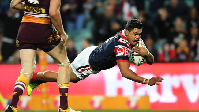 Latrell Mitchell scores the winning try. Picture: Brett Costello