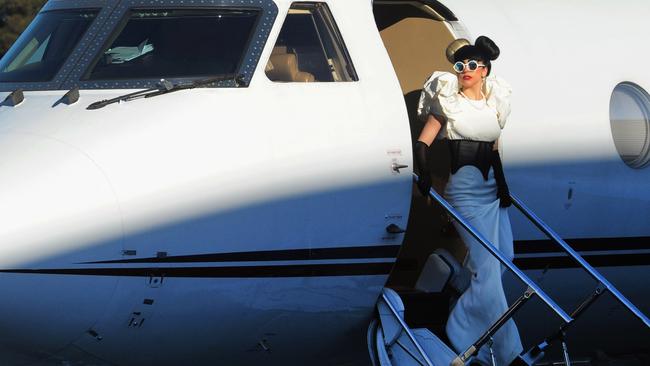 Lady Gaga steps off her private jet as she arrives at Sydney Airport on 2011. Picture: Getty Images