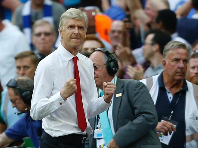 Arsenal's French manager Arsene Wenger celebrates at the final whistle in the English FA Cup final football match between Arsenal and Chelsea at Wembley stadium in London on May 27, 2017. Aaron Ramsey scored a 79th-minute header to earn Arsenal a stunning 2-1 win over Double-chasing Chelsea on Saturday and deliver embattled manager Arsene Wenger a record seventh FA Cup. / AFP PHOTO / Ian KINGTON / NOT FOR MARKETING OR ADVERTISING USE / RESTRICTED TO EDITORIAL USE