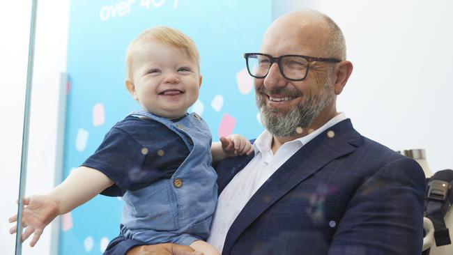 Baby Bunting boss Matt Spencer with baby Finn.