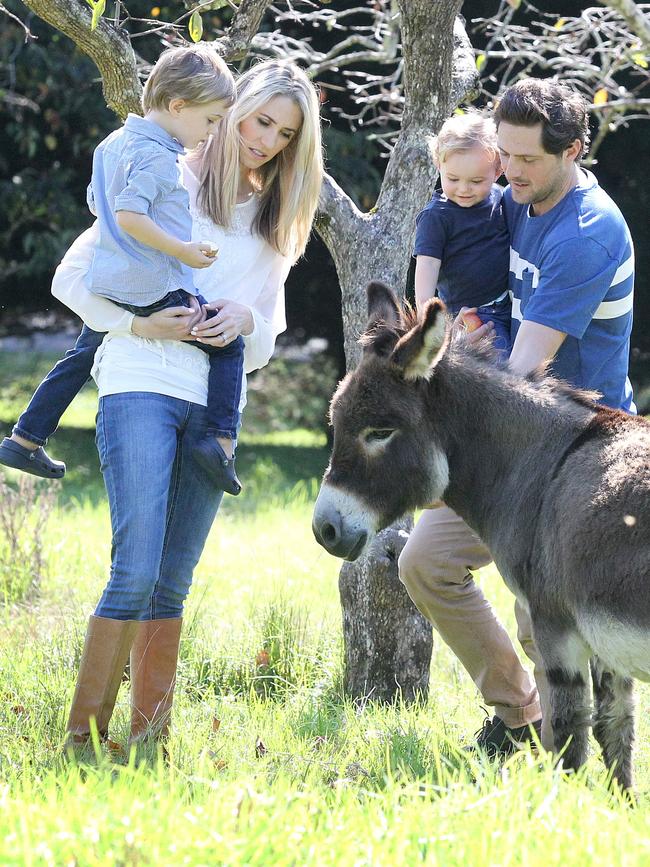 Charlie Albone at his Ourimbah home with his wife interior designer Juliet Love and their two children.