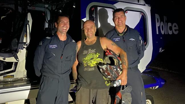 Air Wing officers Craig Carberry and Adam Chamberlain with camper Robert following the rescue near Frenchmans Spur Track on February 21, 2023. Picture: Victoria Police