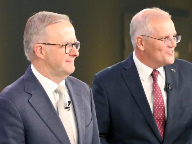 Anthony Albanese and Scott Morrison leave the debate, speaking at the People's Forum, a Scott Morrison and Anthony Albanese debate, Woolloongabba, Brisbane on Wednesday April 20th 2022 - Photo Steve Pohlner