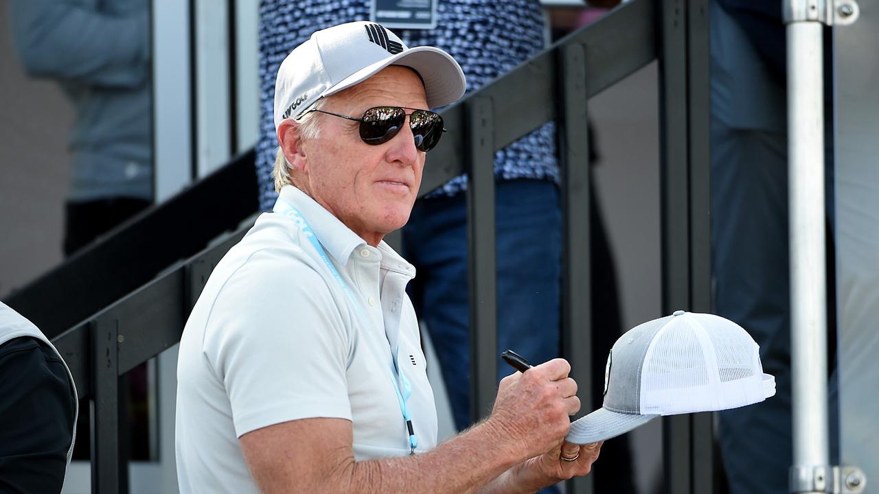 NORTH PLAINS, OREGON - JULY 02: LIV Golf commissioner Greg Norman signs hats from the deck of a pavilion on the 18th green during the final round of the LIV Golf Invitational - Portland at Pumpkin Ridge Golf Club on July 02, 2022 in North Plains, Oregon. Steve Dykes/Getty Images/AFP == FOR NEWSPAPERS, INTERNET, TELCOS &amp; TELEVISION USE ONLY ==