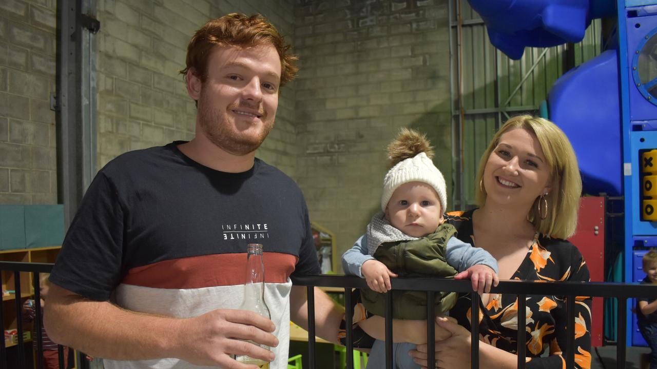 (L) Jacob and Amy Beu with their son Huey enjoy the opening of the Hervey Bay Neighbourhood Centre's Neighbourhood Hive in Hervey Bay. Photo: Stuart Fast