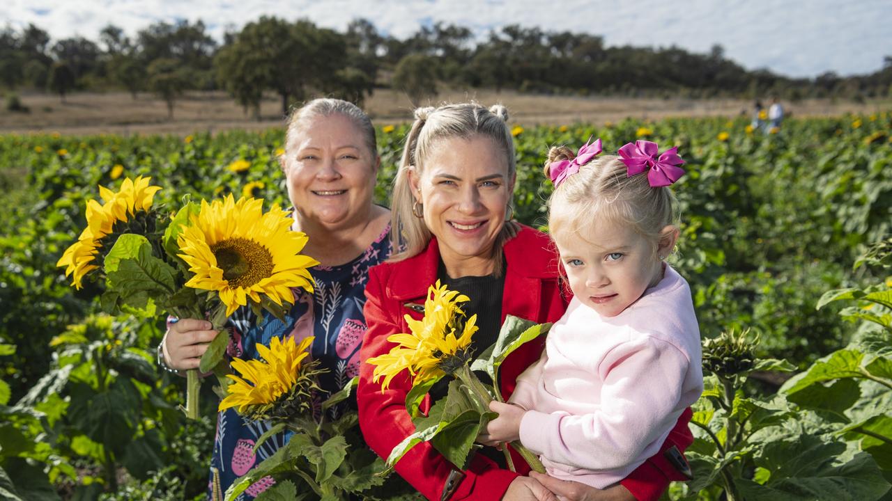 At Warraba Sunflowers are (from left) Leisa Priebe, Hayley Hanna and Charlie Hanna, Saturday, June 22, 2024. Picture: Kevin Farmer