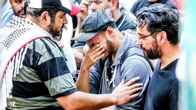 People broke down in tears at a rally in Melbourne to show support for the victims of the Christchurch massacre. Picture: Tim Carrafa