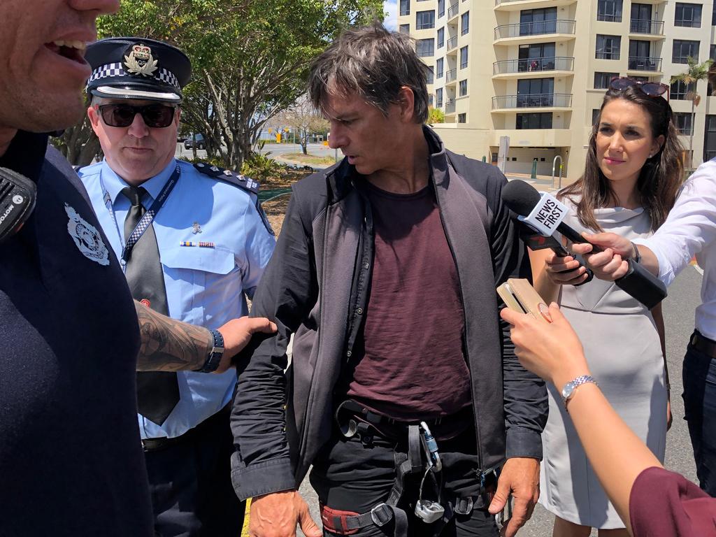 Alleged Story Bridge protester Paul Jukes is arrested. Picture: Peter Wallis