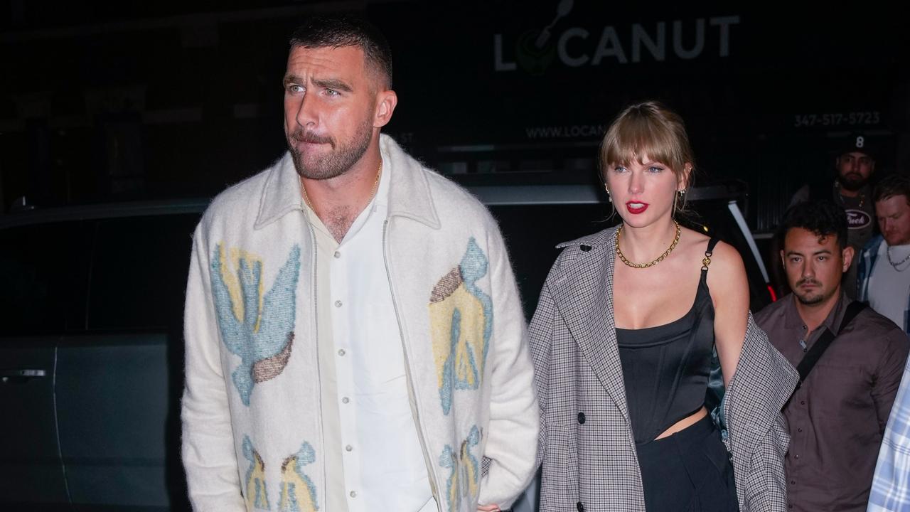 Paparazzi are on hand as Travis Kelce and Taylor Swift arrive at the SNL Afterparty on October 15, 2023 in New York City. (Photo by Gotham/GC Images)