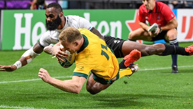 Hodge scores against Fiji. Picture: AFP