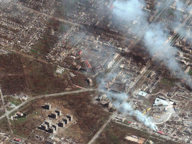 This satellite image released by Maxar Technologies on April 12 shows buildings on fire in eastern Mariupol.