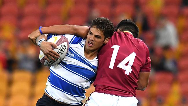 Trezman Banjo of Nudgee College (left) in action during the St Joseph's Nudgee College and Brisbane State High School GPS Rugby match at Suncorp Stadium in Brisbane, Saturday, July 27, 2019. (AAP Image/Dan Peled)