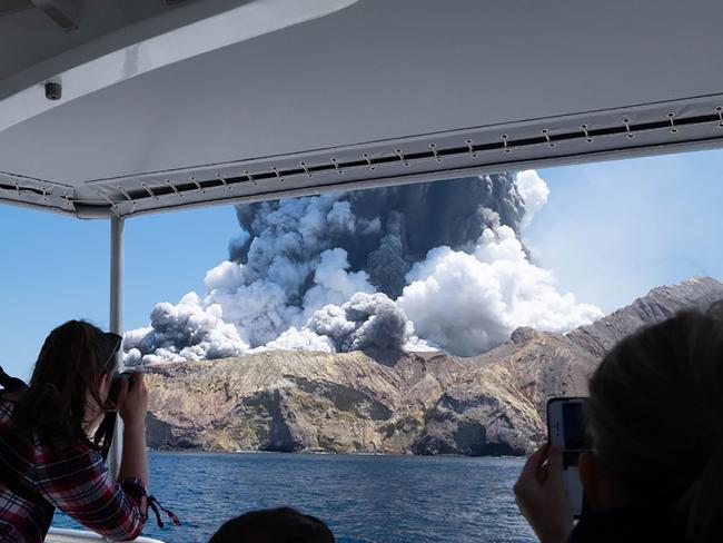 New Zealand's White Island spewing steam and ash moments after it erupted. Picture: AFP