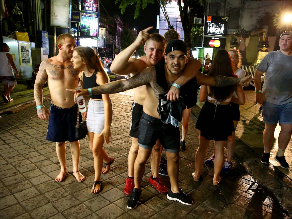 Schoolies walk down the main strip of Kuta, Bali. Picture: Nathan Edwards