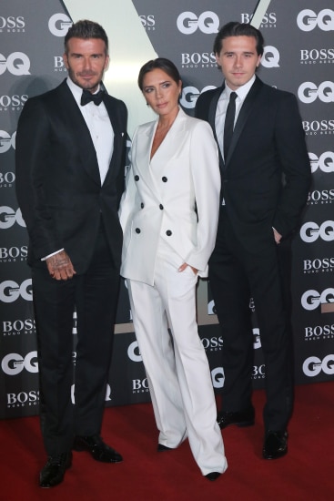 David, Victoria And Brooklyn Beckham Wear Suits For GQ Awards