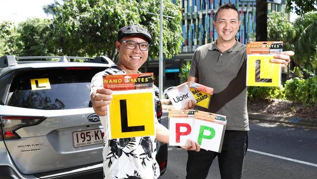 Lester Aler and Vuka Paunovic have invented Nano Plates, learner and provisional plates for vehicles designed with special adhesive that sticks especially well to glass, but also plastics and metal. Picture: Brendan Radke