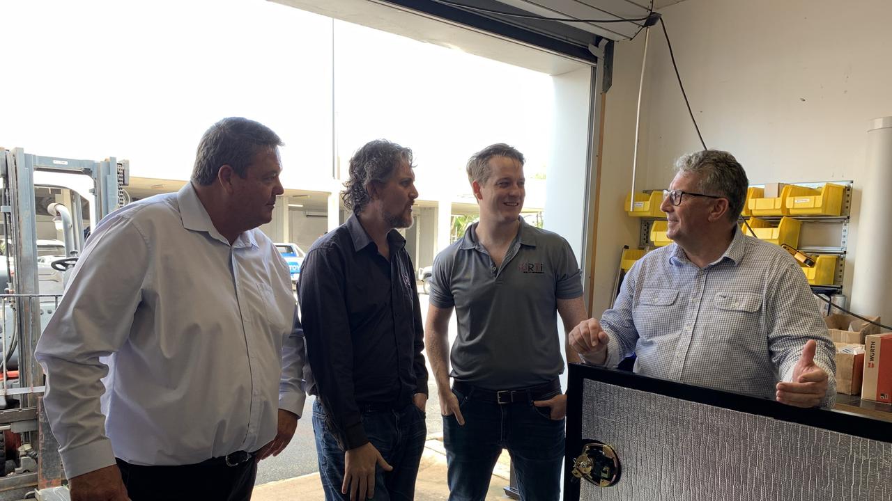 (From left to right) Dawson Nationals candidate Andrew Willcox, Robin Sheehy and Bradley Roper from Real Time Instruments and Resources Minister Keith Pitt review the AllScan n-Gen elemental analyser in Mackay on April 27. Picture: Duncan Evans