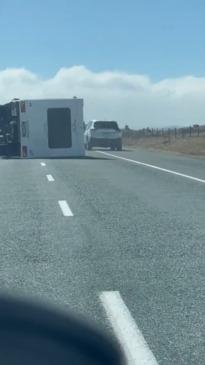 Car swerves to avoid out of control sliding campervan