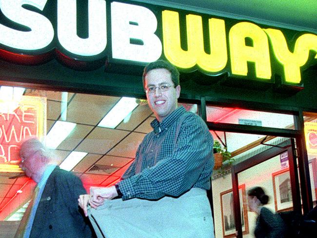 MAY 14, 2002 : Jared Fogle outside Subway outlet in Sydney 14/05/02, lost over 100 kg in weight after eating Subway sandwiches for one year, shown with his old 61 inch pants. Pic Jeremy Piper. NSW / Restaurant / Interior People / Weight Loss