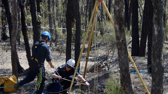 Police at Kangaroo Flat where the body of Simone Quinlan was found down a mine shaft. Picture Daryl Pinder