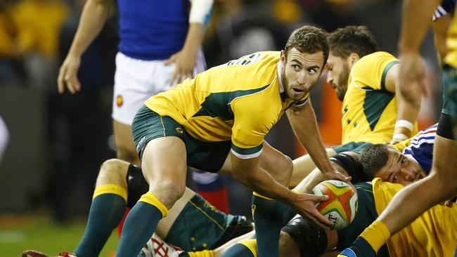 Wallabies v France at Etihad Stadium. Nic White looks to pass off . Pic: Michael Klein. Saturday June 14, 2014.