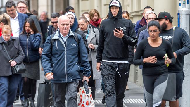 The trio blended in with unsuspecting Melbourne locals. Picture: Jake Nowakowski