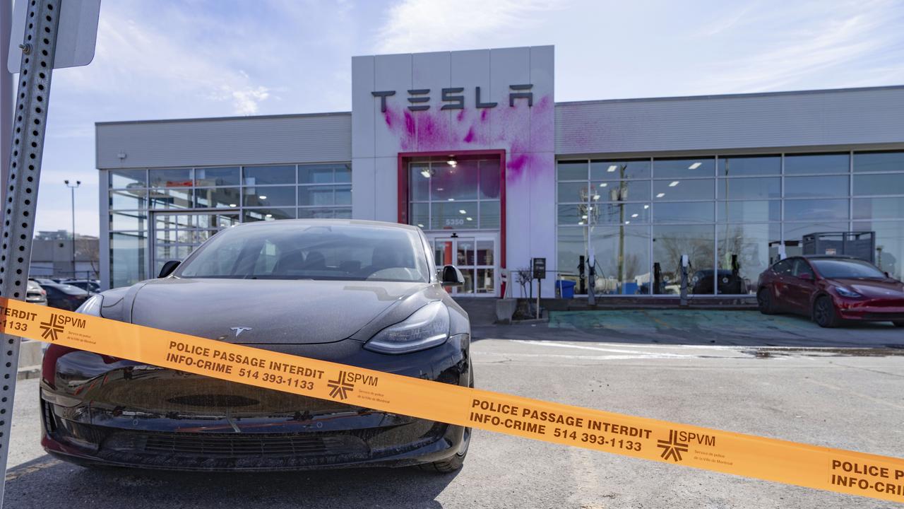 <!DOCTYPE html PUBLIC "-//W3C//DTD HTML 4.0 Transitional//EN" "http://www.w3.org/TR/REC-html40/loose.dtd"><html><body><p>In Canada, a Montreal Tesla dealership was vandalised with pink paint. Picture: Christinne Muschi/The Canadian Press via AP</p></body></html>