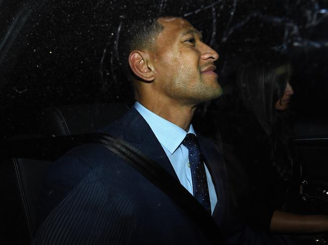 Folau smiles as he leaves a Code of Conduct hearing in Sydney last night. Picture: AAP Image/Joel Carrett