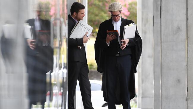 A barrister is seen outside the Supreme Court in Brisbane, Thursday, March 9, 2017.  (AAP Image/Dave Hunt) NO ARCHIVING