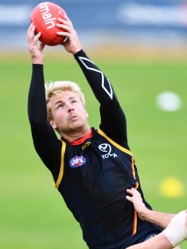 Billy Frampton flies for a mark at training. Picture: Mark Brake/Getty Images