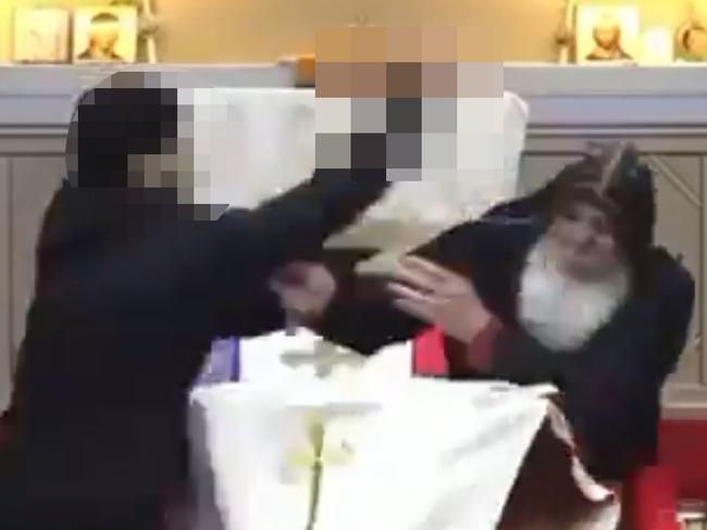 Blurred footage for the 15 year old boy who stabbed the Bishop Mar Mari Emmanuel during a service.at The Good Shepard Church in Sydney last night. Picture: Twitter