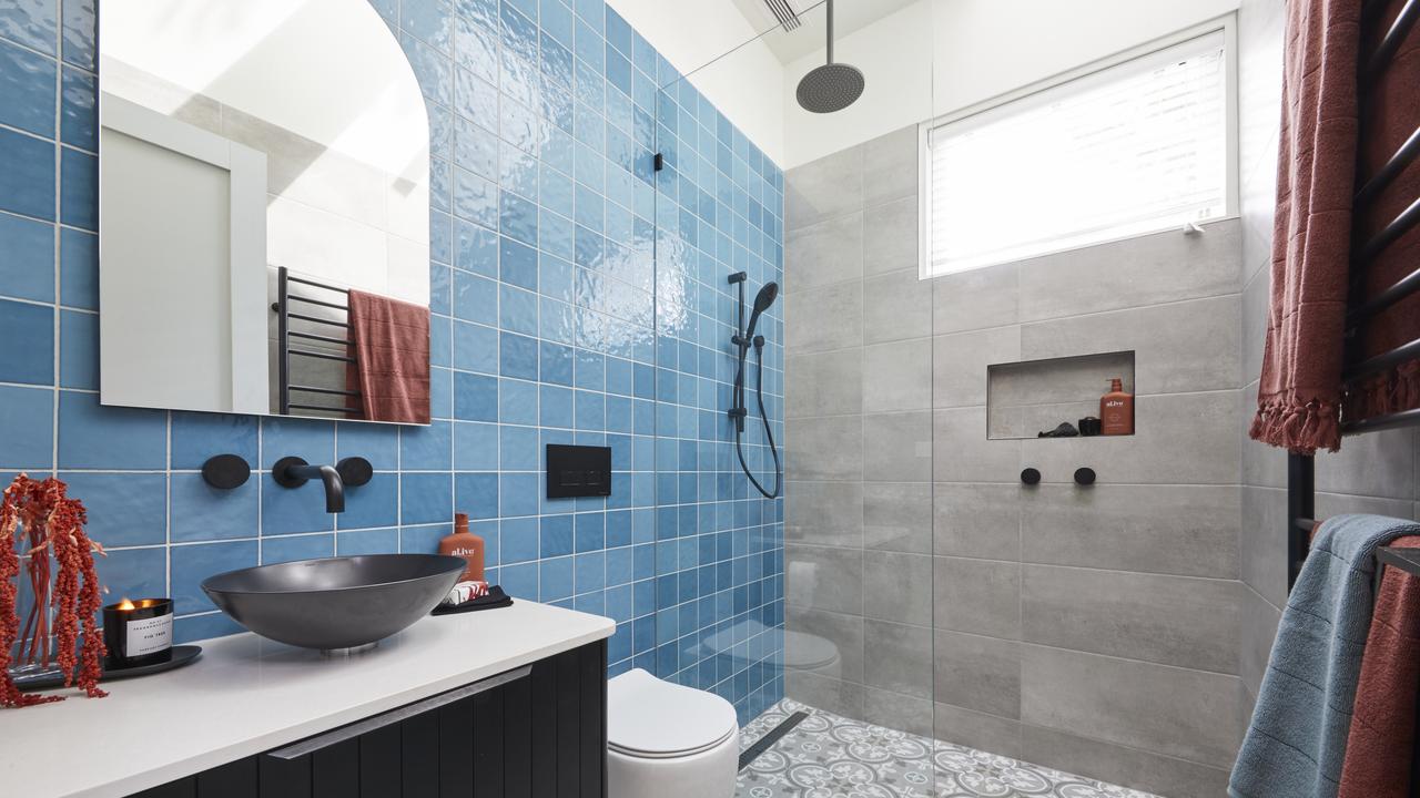 Statement blue tiles gave the bathroom an exotic feel.