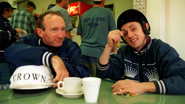 Dittman takes a spell with Shane Dye after trackwork at Flemington in 1996.