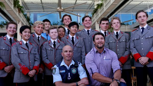 Police school liaison officer Rob Paterson and Nathan Hindmarsh with students from The King’s School.