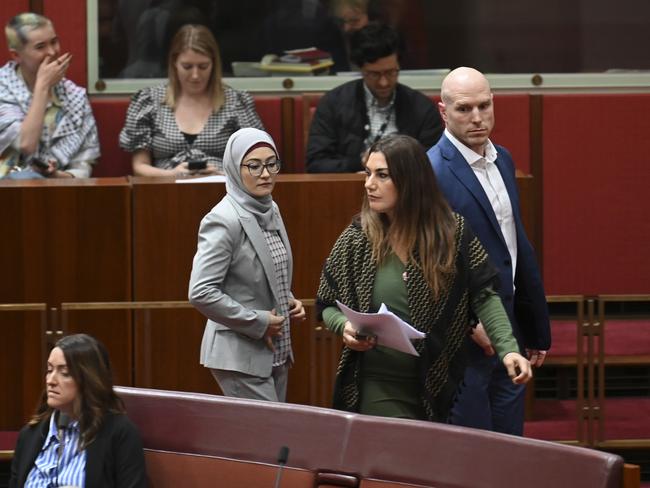 CANBERRA, Australia - NewsWire Photos - June 25, 2024: Senator Fatima Payman crosses the floor to support Senator Mehreen Faruqi motion to have the Senate recognise Palestine as a state at Parliament House in Canberra. Picture: NewsWire / Martin Ollman